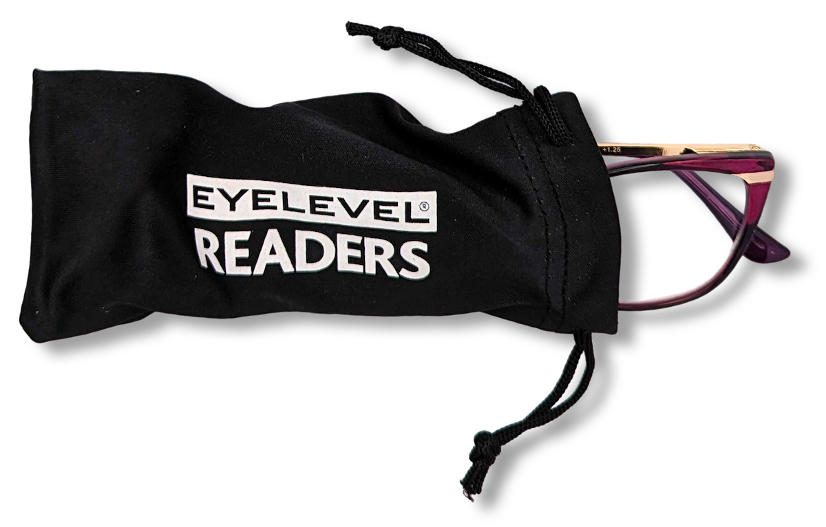 Eyelevel-UK Barbados pink cat-eye reading glasses partially inside a black branded drawstring storage pouch