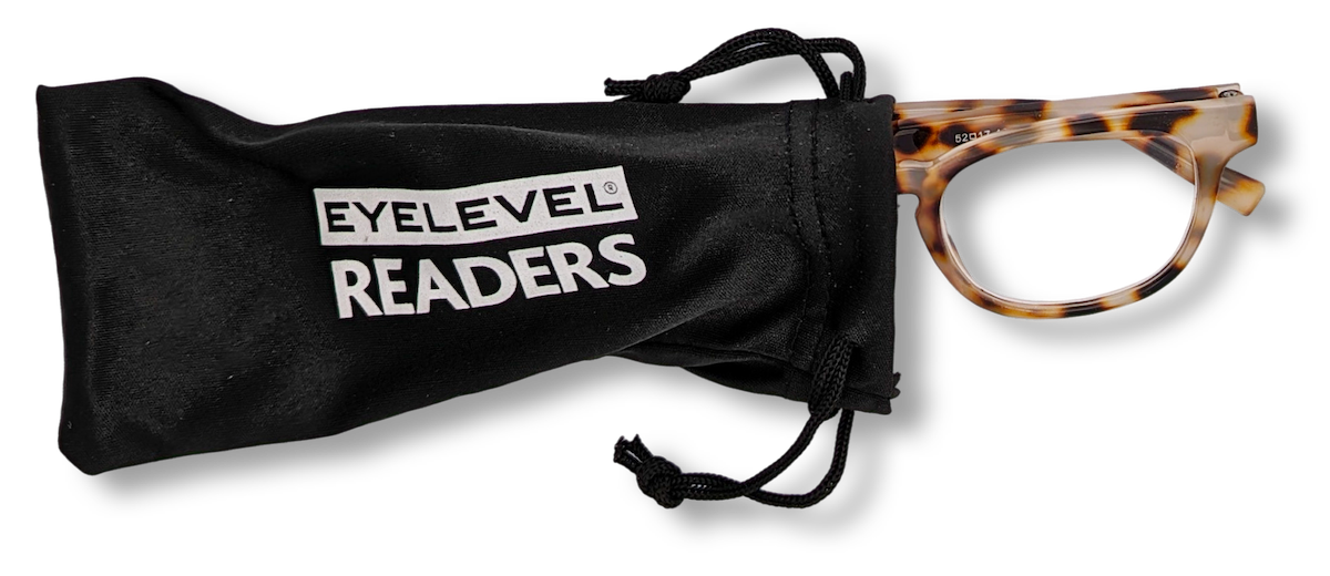 Eyelevel-UK Brazil reading glasses with a light tortoiseshell rounded frame peeking out of a black drawstring pouch