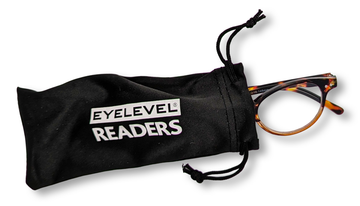 Eyelevel-UK Budapest reading glasses with tortoiseshell frames peeking out of a black branded drawstring pouch