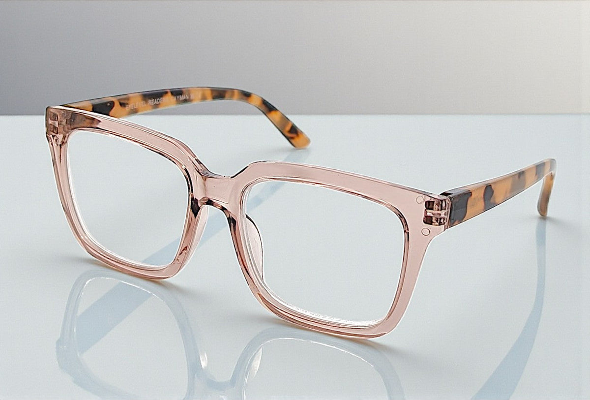 Eyelevel-UK Cayman reading glasses with a pale-pink squared frame and tortoiseshell-patterned arms on a white surface.