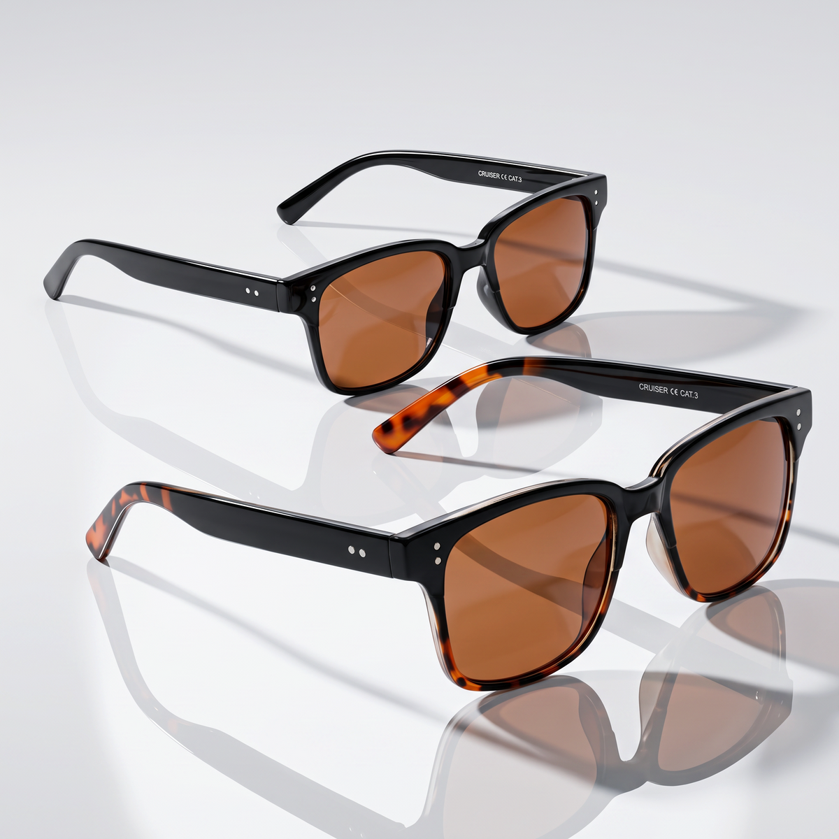 Eyelevel-UK Cruiser driving sunglasses featuring black and tortoiseshell frames with high density brown lenses.