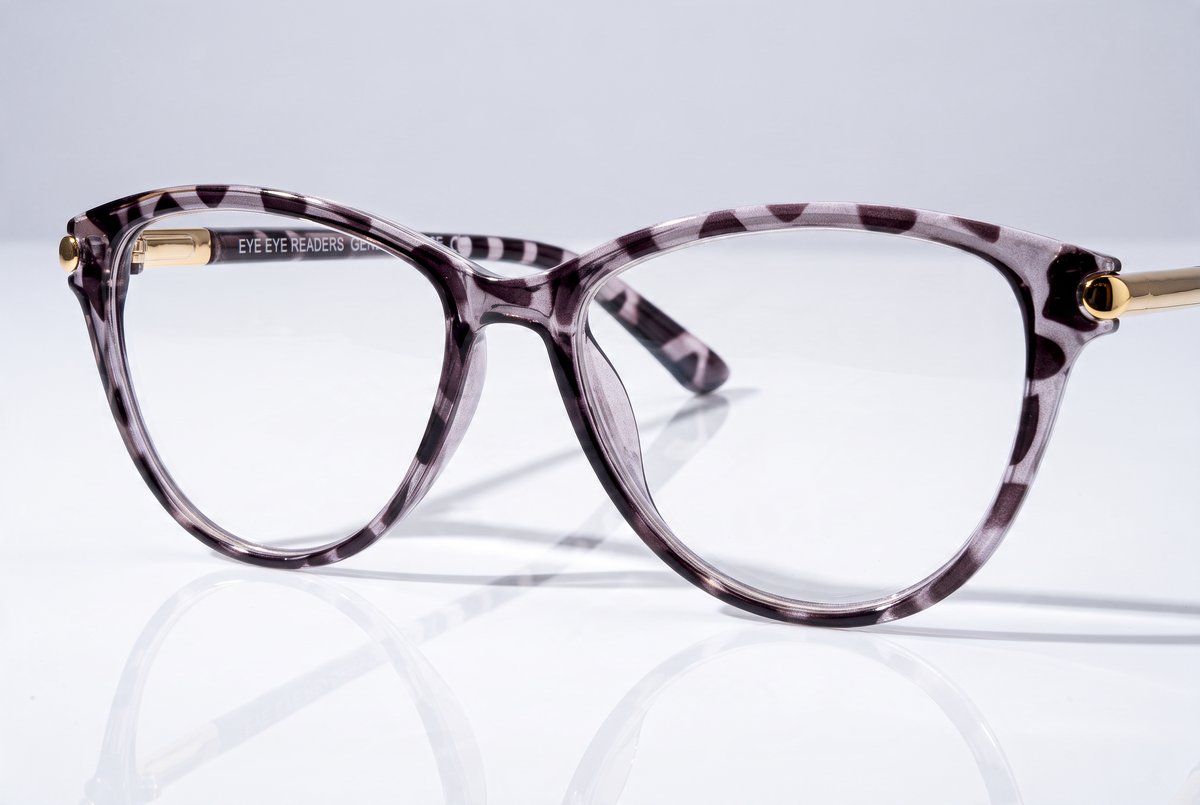 Eyelevel-UK Georgia reading glasses with a pink and black patterned square frame and gold-tone temple accents.