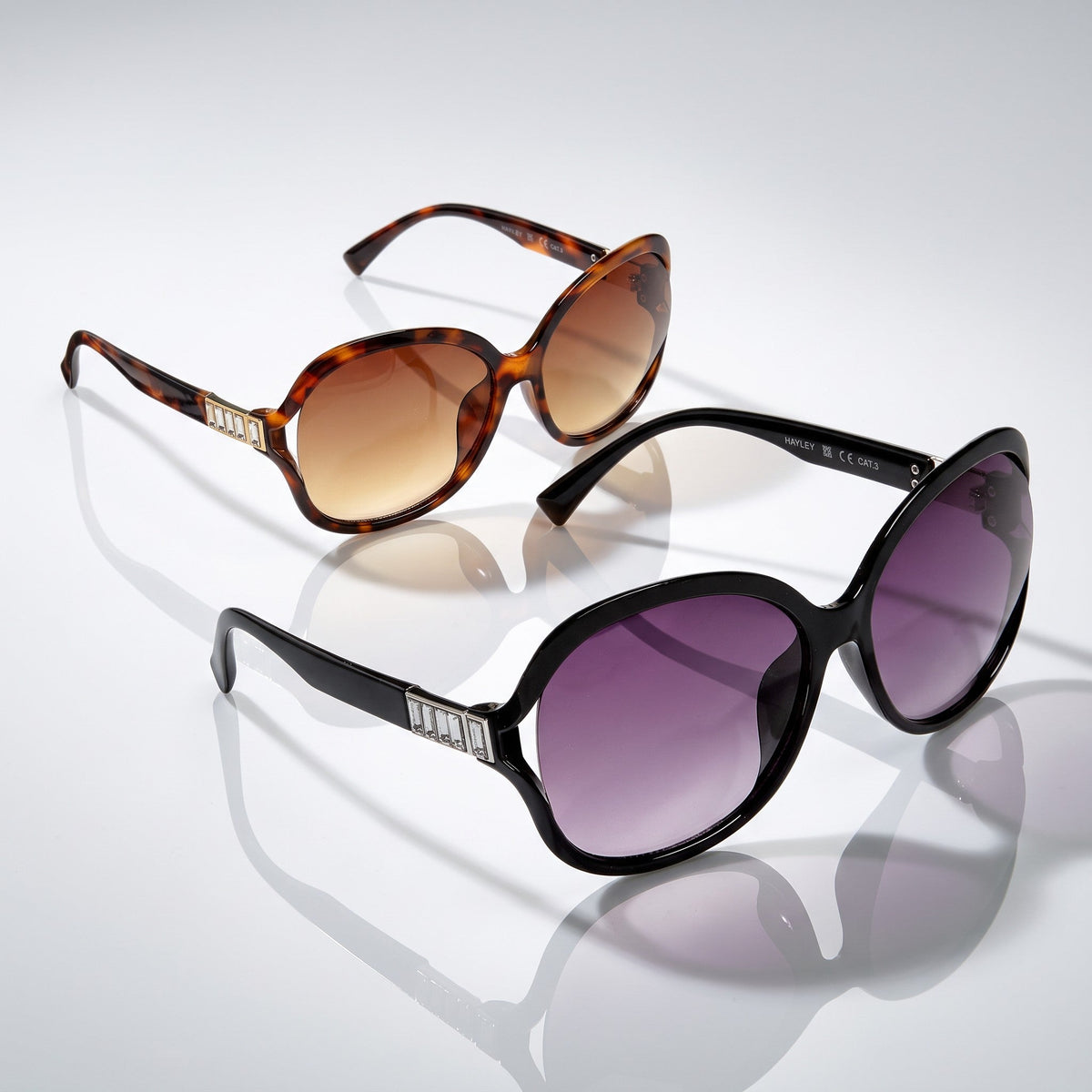Eyelevel-UK Hayley oversized ladies sunglasses in black and brown tortoiseshell with stone-detailed temples.