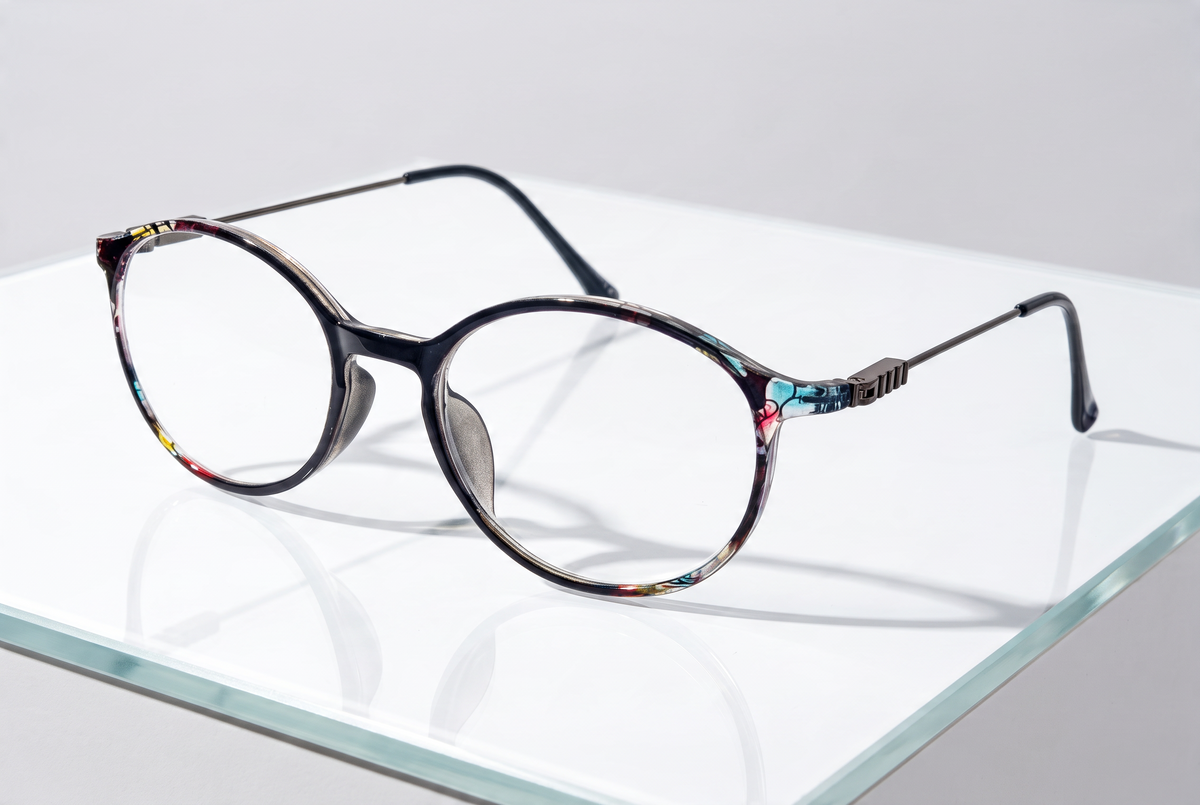 Eyelevel-UK Idaho reading glasses featuring a round, multi-coloured patterned frame with slim metal temples.