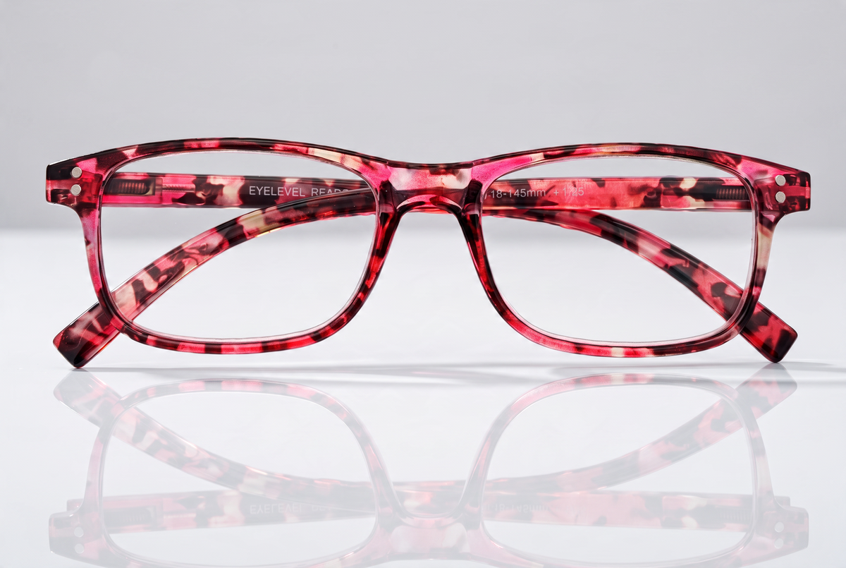 Eyelevel-UK Jamaica reading glasses featuring a pink and multicolour square plastic frame with clear magnifying lenses.