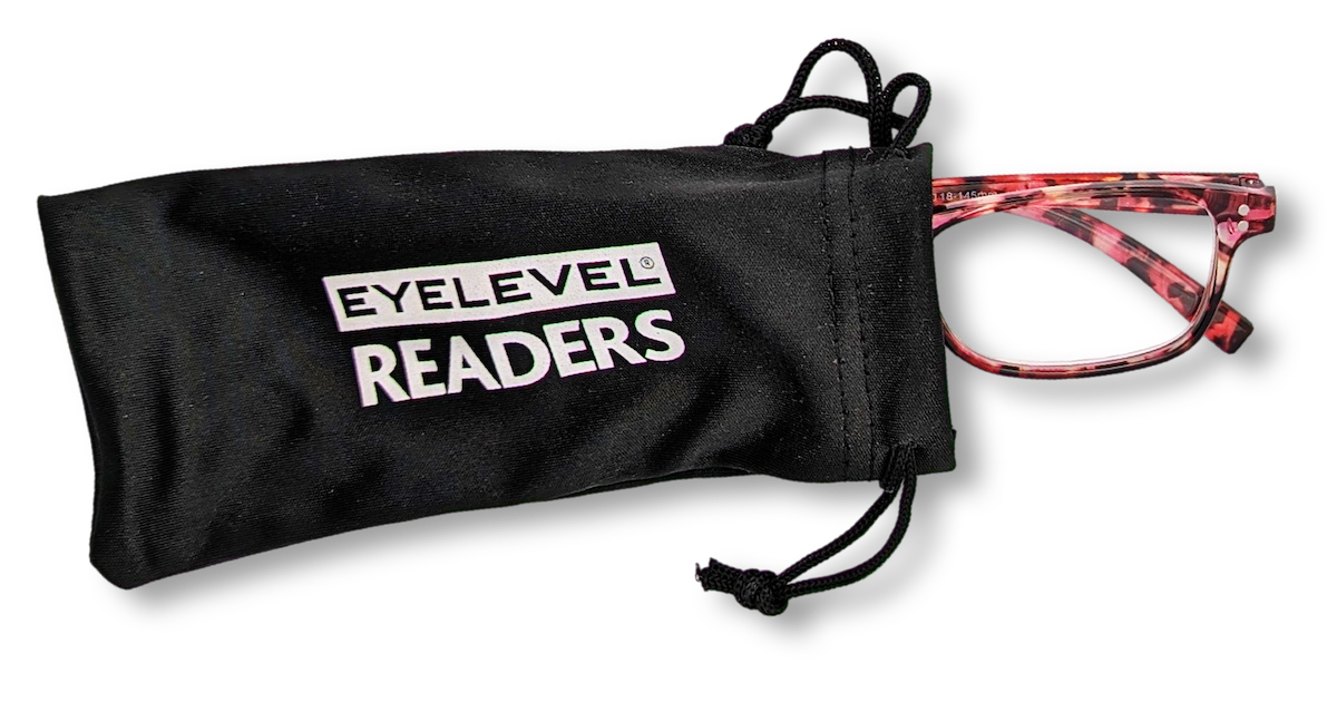 Eyelevel-UK Jamaica square reading glasses with pink multicolour frames peeking out of a black branded storage pouch.