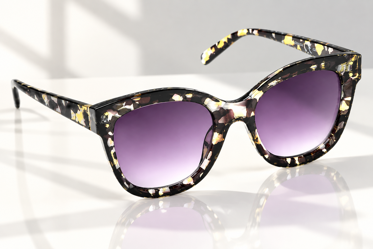 Eyelevel-UK Jessica square fashion sunglasses with a clear and black tortoiseshell frame and grey gradient lenses.