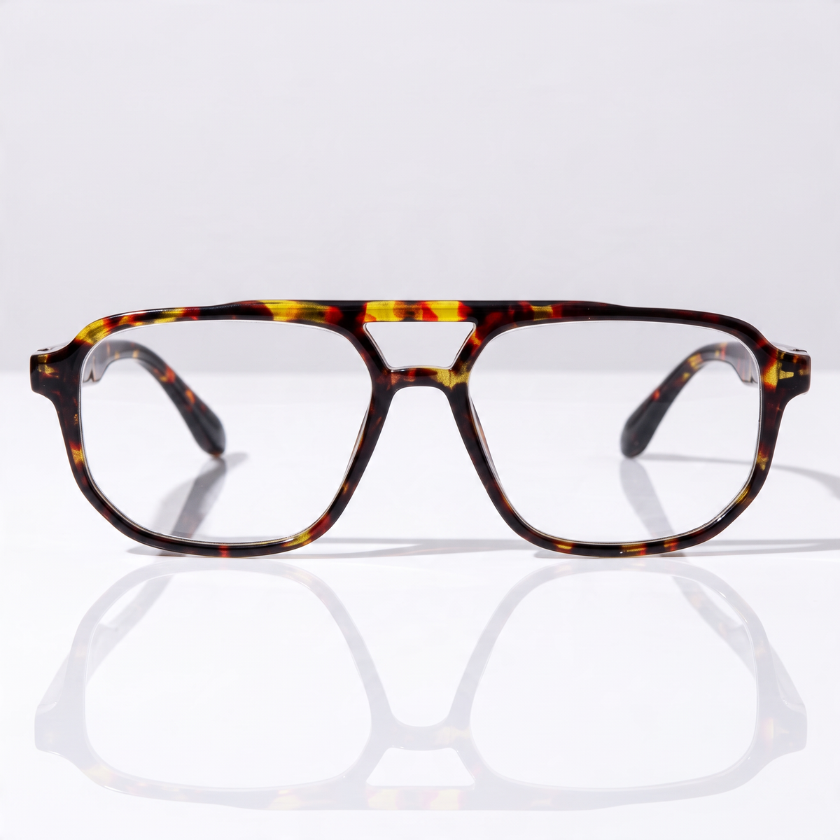 Eyelevel-UK Lancaster brown tortoiseshell square reading glasses with a retro full rim frame on a reflective surface.