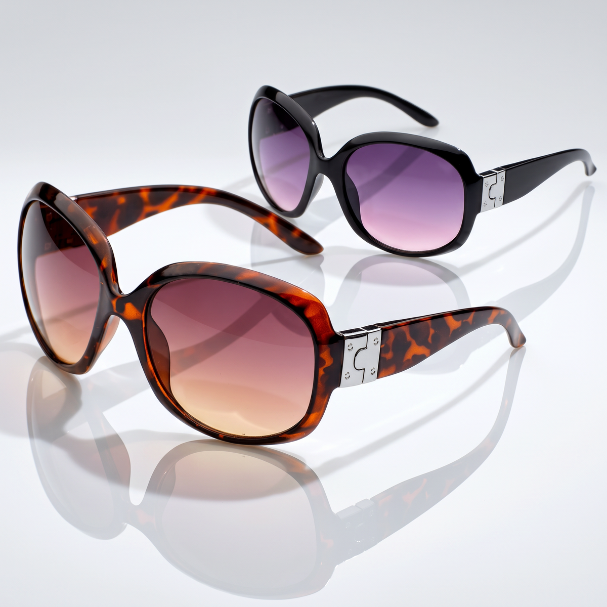 Eyelevel-UK Lucy oversized geometric sunglasses in brown tortoiseshell and black with gradient lenses on white surface