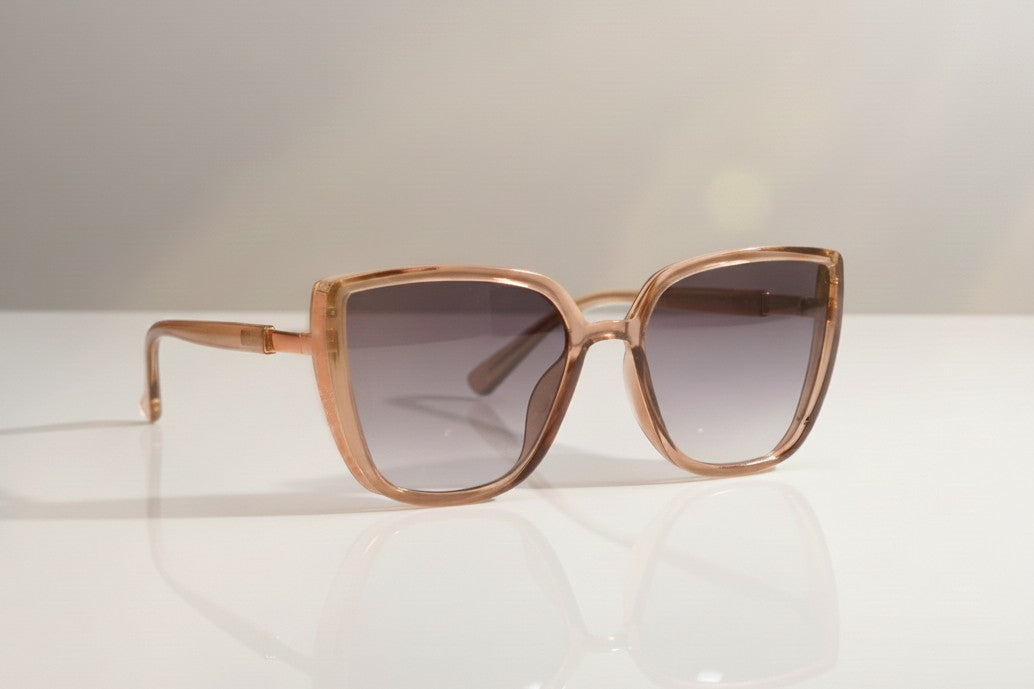 Eyelevel-UK Nicole oversized sunglasses with a brown crystal frame and grey gradient lenses for UV400 protection.