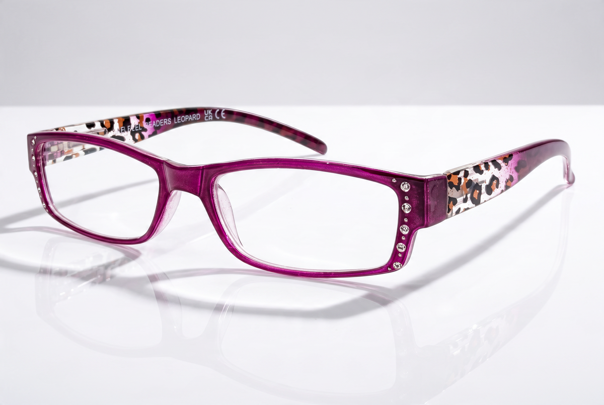 Eyelevel-UK leopard print reading glasses with pink rectangular frames and decorative crystal accents on the sides.