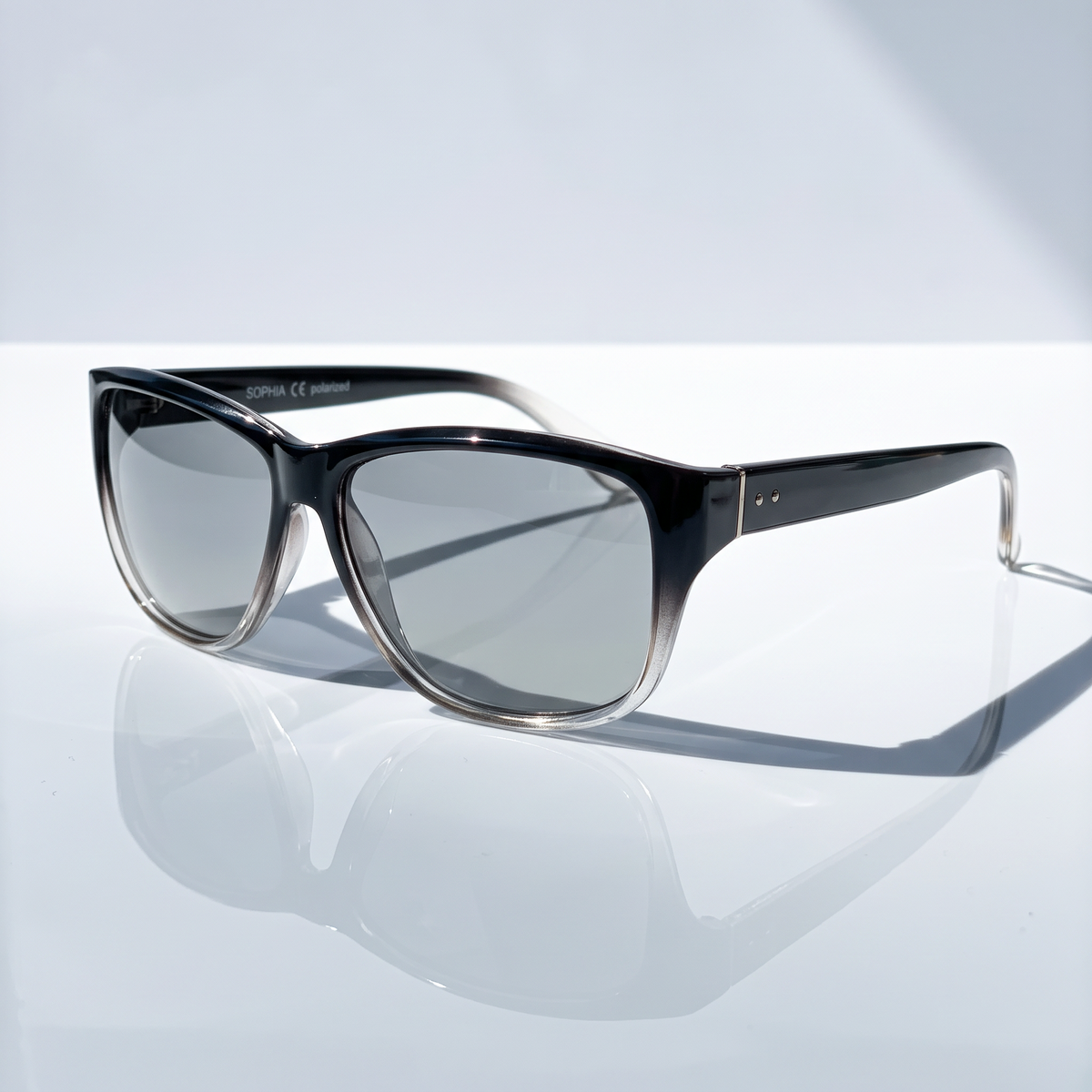 Eyelevel-UK Sophia rectangular polarized sunglasses in black and clear gradient frame with grey lenses