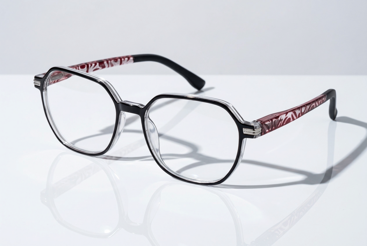 Eyelevel-UK St Kitts reading glasses with translucent grey square frames and patterned black and red temples.