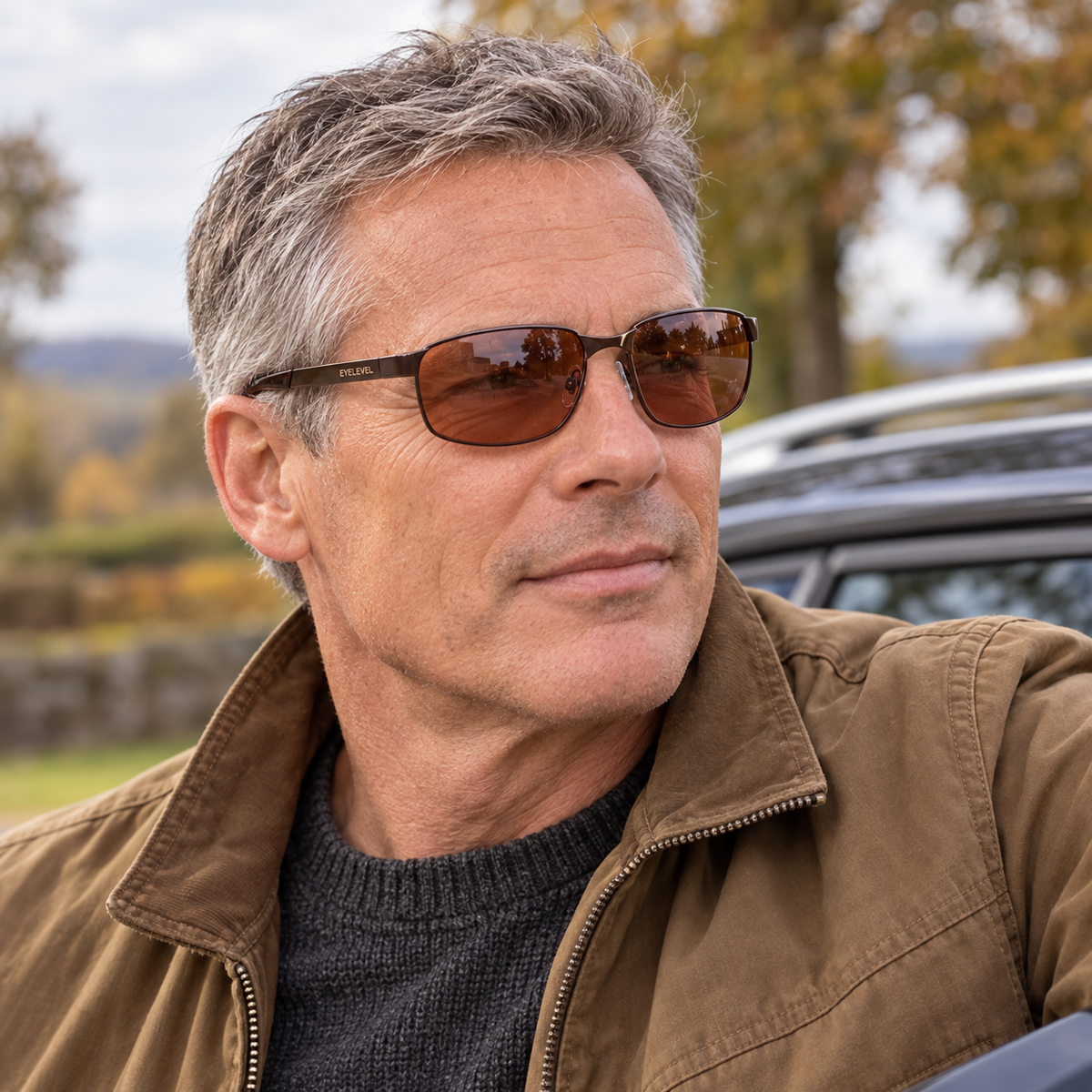 Eyelevel-UK Stirling polarized driving sunglasses with copper lenses worn by a man in a brown jacket outdoors