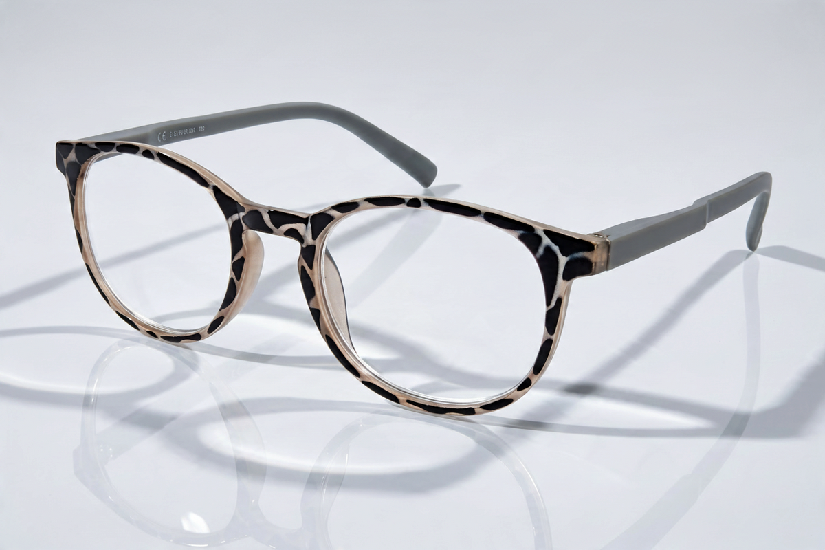 Eyelevel-UK Ecuador reading glasses featuring a black and white patterned oval frame with grey temples.