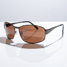 Eyelevel-UK Accelerate driving sunglasses with gunmetal frame and polarized copper lenses for reduced road glare.