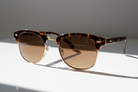 Eyelevel-UK Albany brown tortoiseshell and gold semi-rimless sun readers with tinted UV400 magnifying lenses.