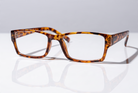 Eyelevel-UK Alfie Brown rectangular reading glasses with a classic tortoiseshell plastic frame on a white surface.