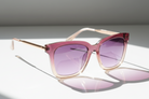 Eyelevel-UK Anastacia oversized square sunglasses in rose and crystal clear with rose gold accents and gradient lenses.