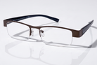 Eyelevel-UK Apollo semi-rimless reading glasses with bronze rectangular frames and dark temples on a white surface