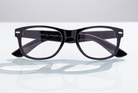 Eyelevel-UK Ashley black rectangular reading glasses with clear magnifying lenses and a classic full rim plastic frame.