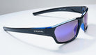 Eyelevel-UK Attack sports sunglasses with black frames and blue accents, featuring purple UV-400 lenses.