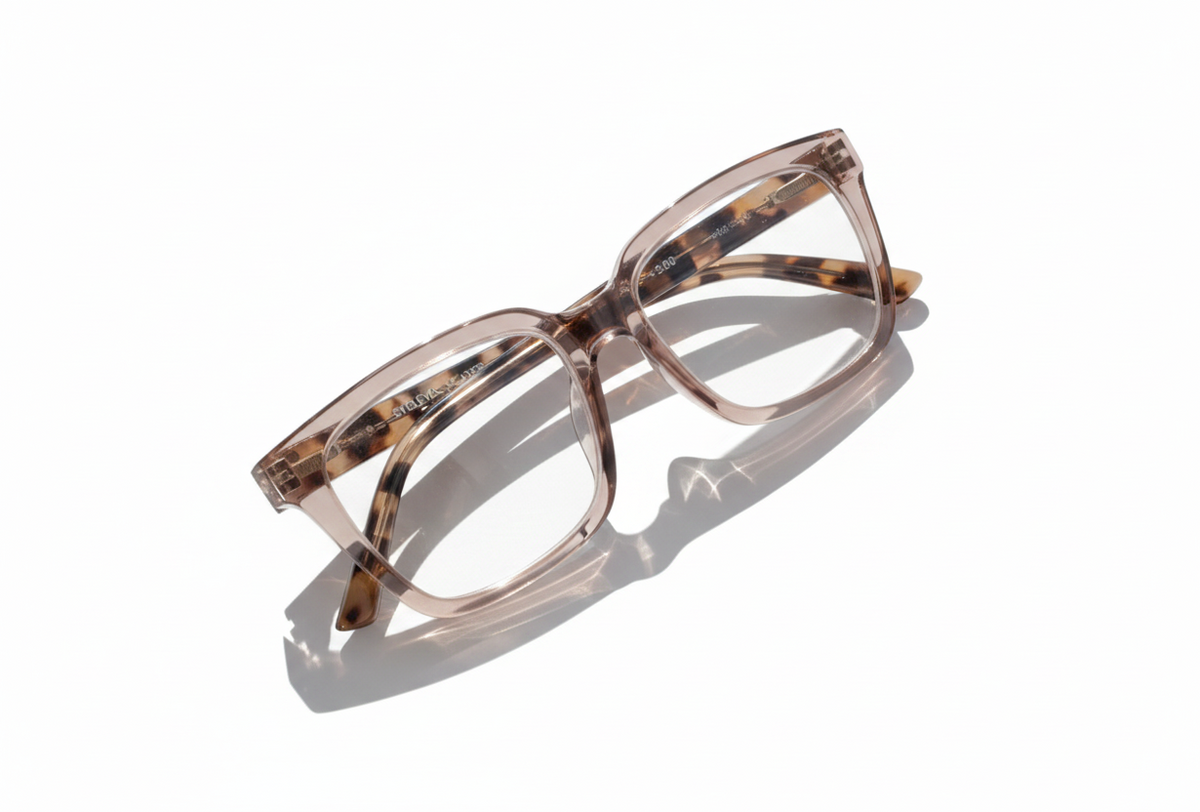 Eyelevel-UK Cayman reading glasses with a pale-pink squared frame and tortoiseshell detailing on a white background
