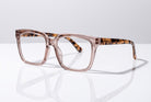 Eyelevel-UK Cayman reading glasses with a pale-pink squared frame and tortoiseshell patterned temples.