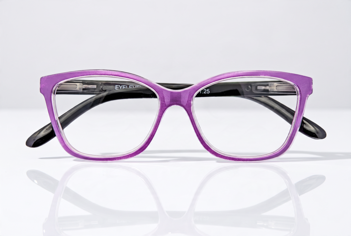 Eyelevel-UK Courtney reading glasses with a purple and grey rounded square plastic frame and clear magnifying lenses.