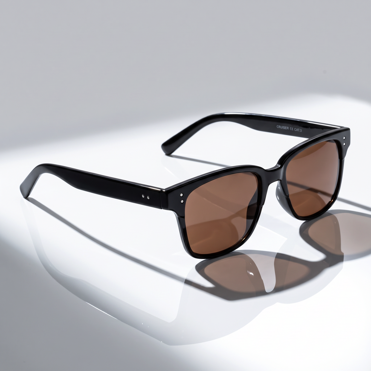 Eyelevel-UK Cruiser driving sunglasses with black frames and high density brown lenses for improved road contrast.