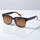 Eyelevel-UK Cruiser driving sunglasses with black and tortoiseshell frame and high density brown tinted lenses.