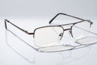 Eyelevel-UK Cuba reading glasses with a grey metal semi-rimless rectangular frame and clear magnifying lenses.