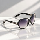 Eyelevel-UK Danielle oversized black fashion sunglasses with grey gradient lenses and decorative chain-link arms