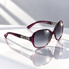 Eyelevel-UK Danielle oversized purple fashion sunglasses with grey gradient lenses and decorative chain-link arms.