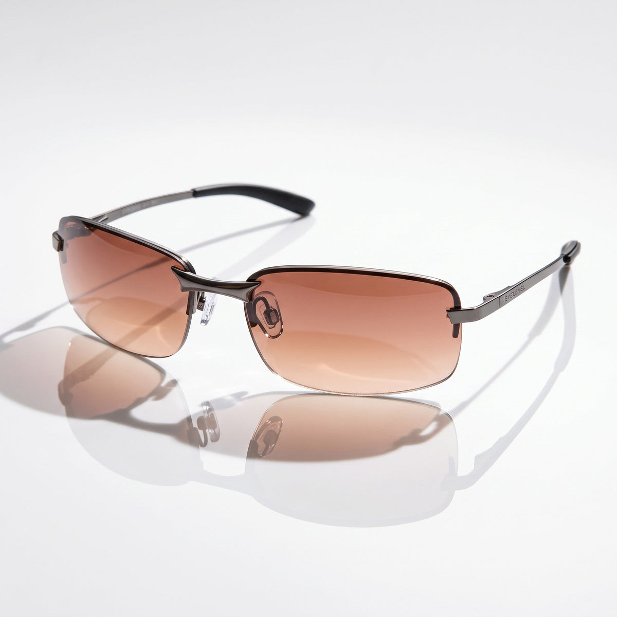 Eyelevel-UK Daytona driving sunglasses with gunmetal frames and high density brown lenses for road glare reduction.