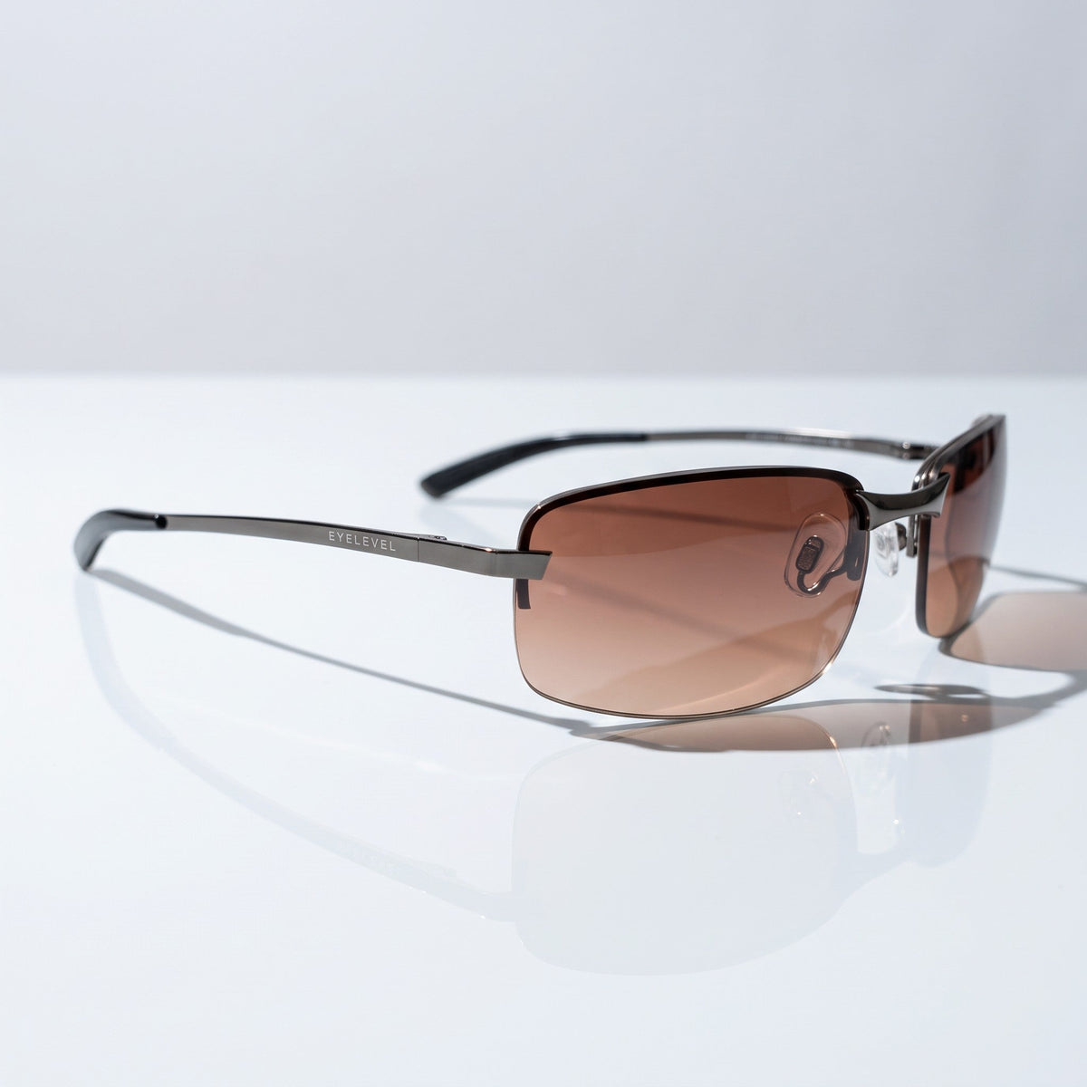 Eyelevel-UK Daytona driving sunglasses with gunmetal frames and high density brown lenses for road contrast.