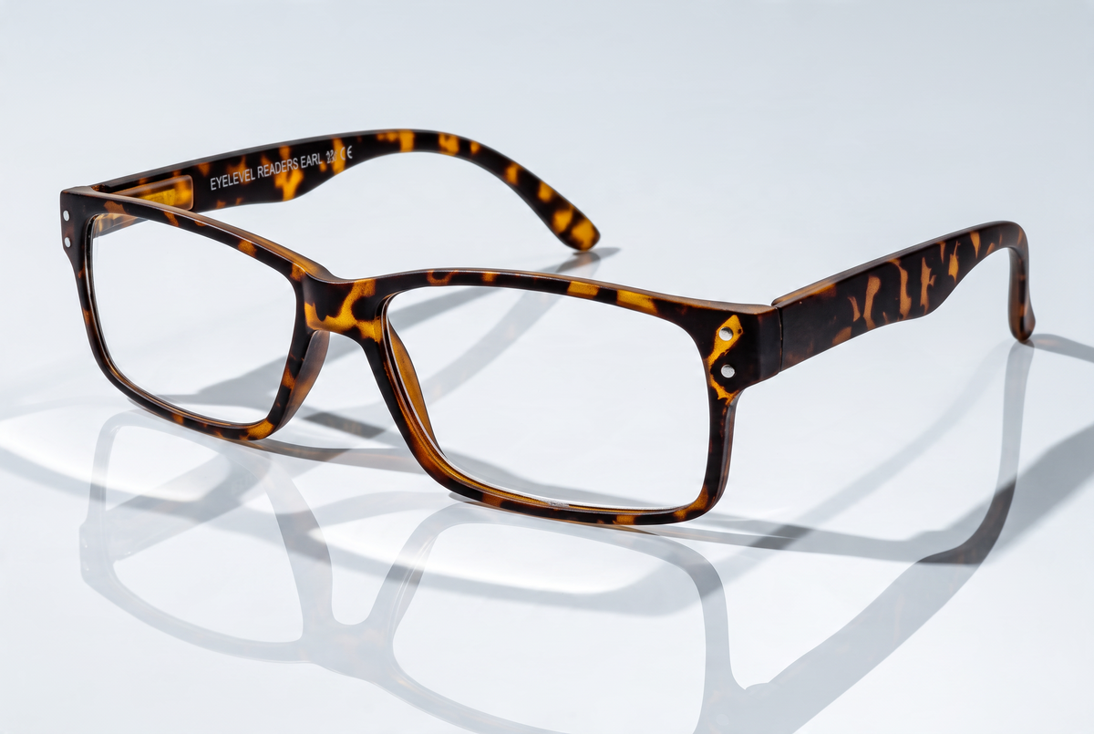 Eyelevel-UK Earl reading glasses with a brown tortoiseshell rectangular plastic frame on a reflective white surface