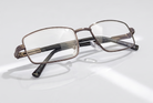 Eyelevel-UK Esquire reading glasses featuring a silver rectangular metal frame and clear magnifying lenses.
