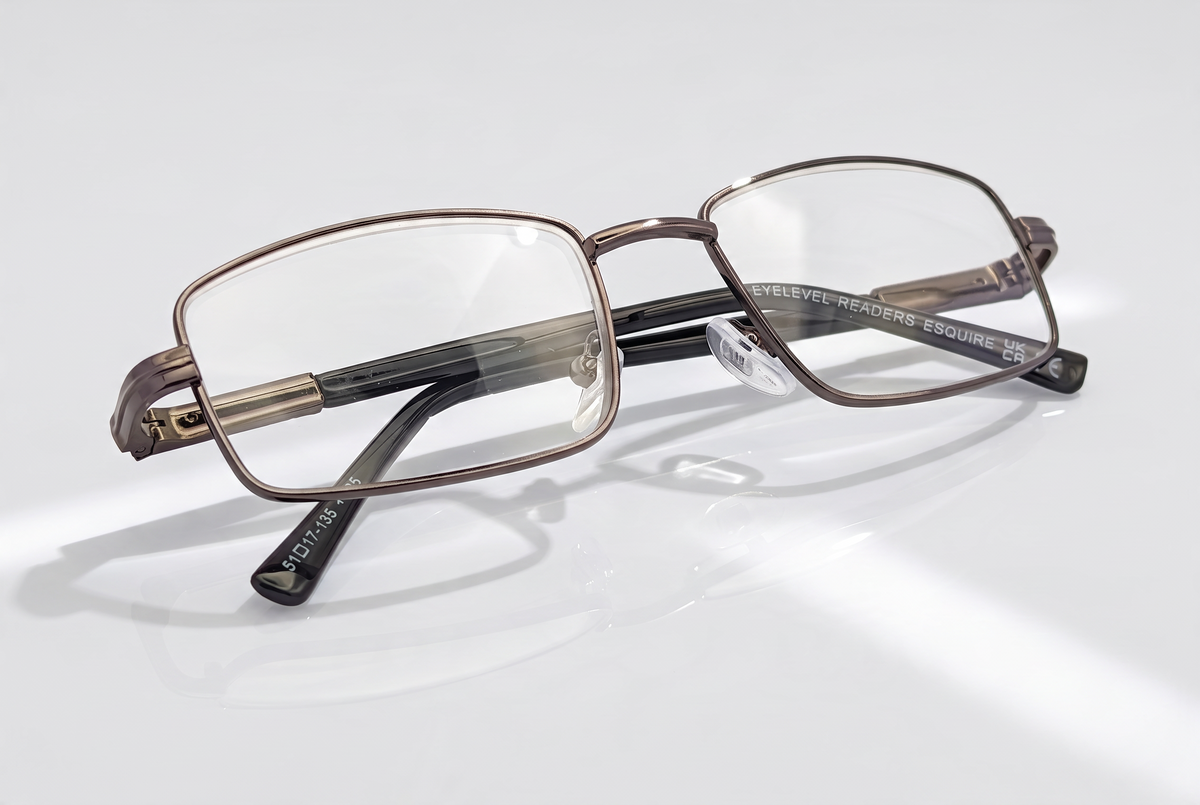 Eyelevel-UK Esquire reading glasses featuring a silver rectangular metal frame and clear magnifying lenses.