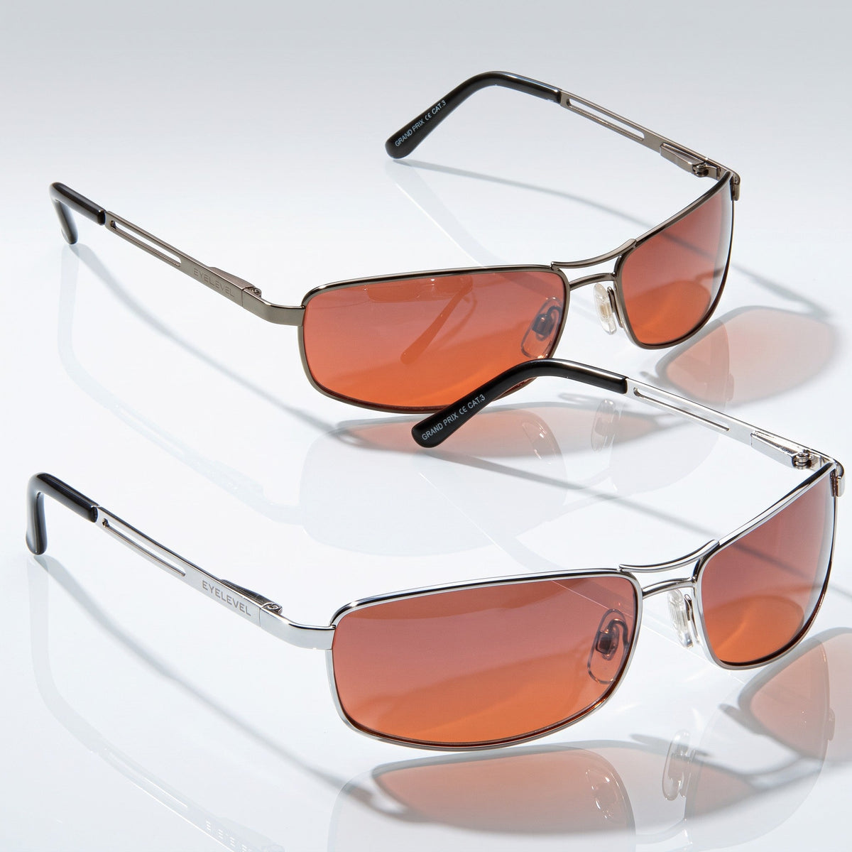 Eyelevel-UK Grand Prix driving sunglasses in silver and gunmetal frames with high density copper-tinted lenses.