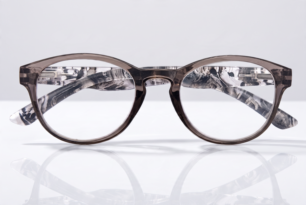 Eyelevel-UK Haiti reading glasses with a grey and white patterned oval frame and clear magnifying lenses.
