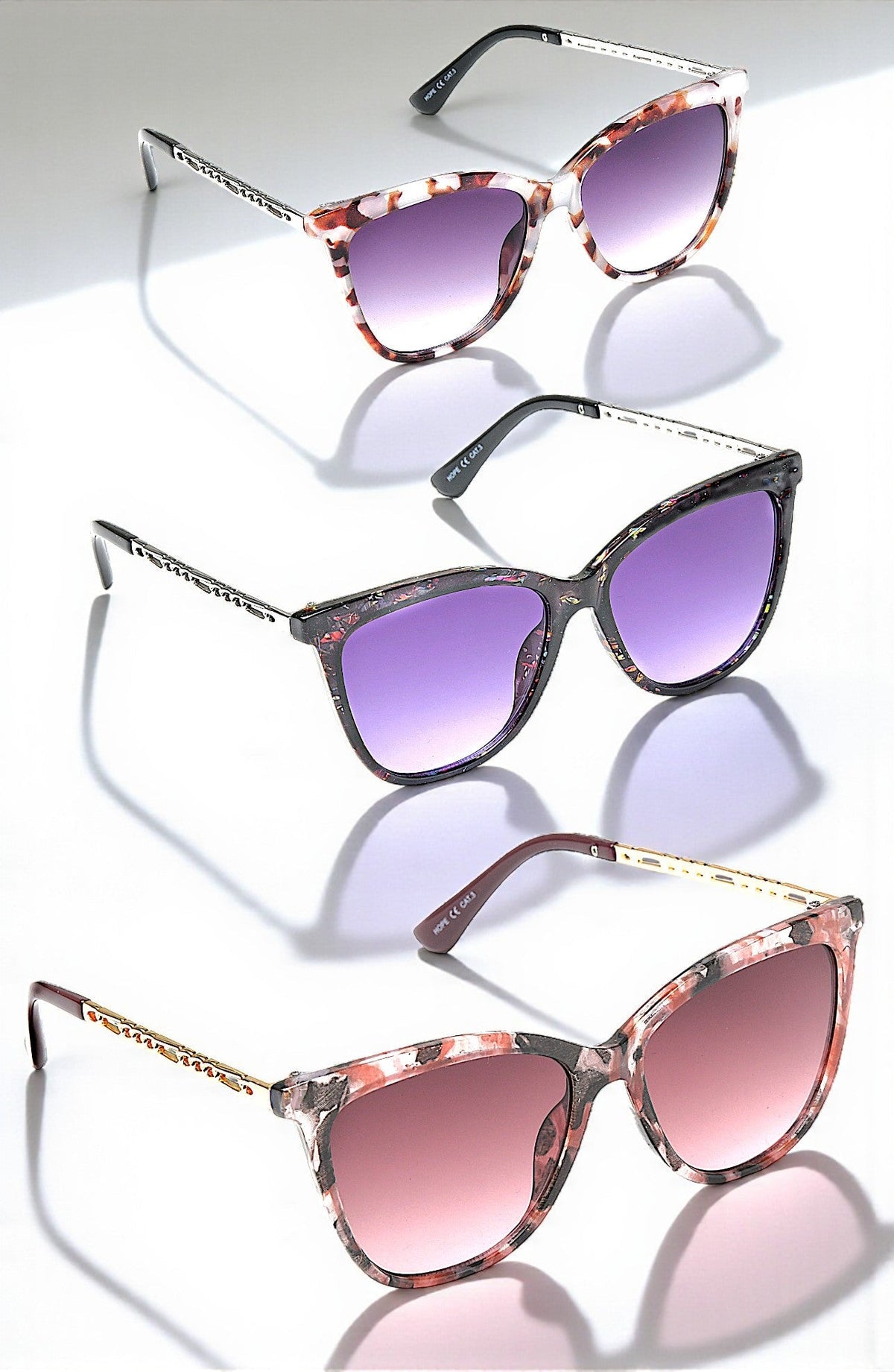 Eyelevel-UK Hope square ladies fashion sunglasses in three colour variations with gradient lenses on a white surface