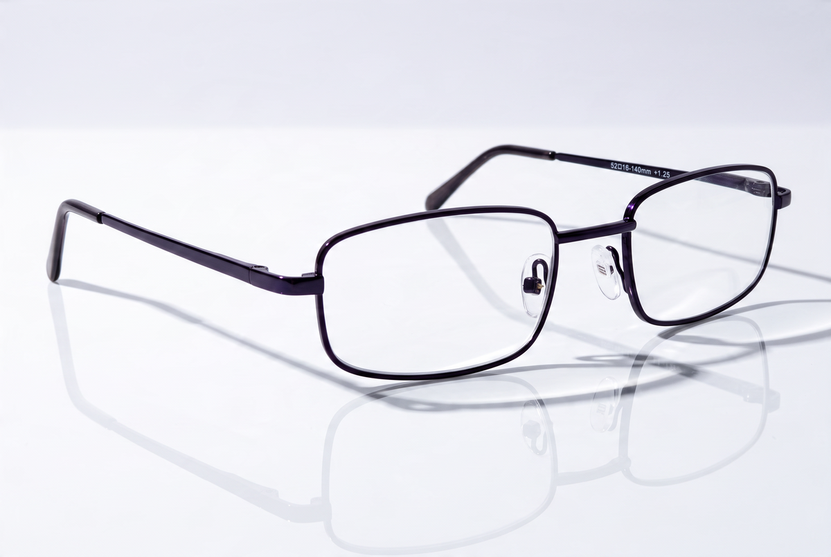 Eyelevel-UK Keats reading glasses with a dark grey rectangular metal frame and clear magnifying lenses