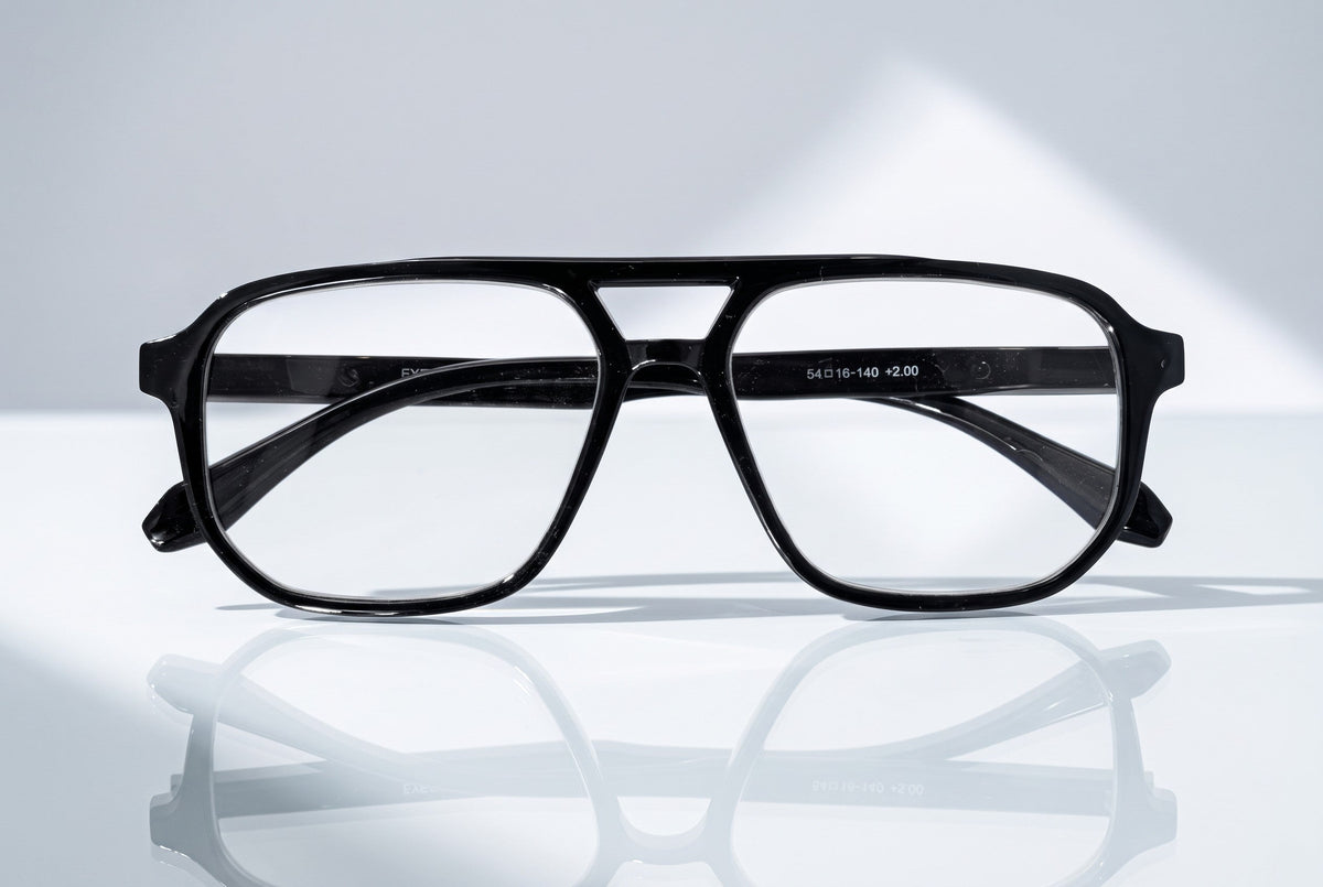 Eyelevel-UK Lancaster black square reading glasses with a double bridge design on a reflective white surface.