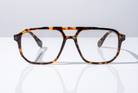 Eyelevel-UK Lancaster brown tortoiseshell square reading glasses with a retro double bridge design on a white surface.