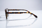 Eyelevel-UK Lancaster Brown reading glasses with a square tortoiseshell plastic frame, shown from a side profile view.