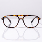 Eyelevel-UK Lancaster brown tortoiseshell square reading glasses with a retro full rim frame on a reflective surface.