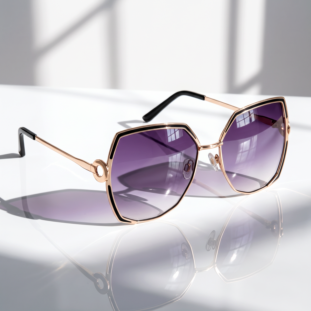 Eyelevel-UK Lauren geometric ladies sunglasses with light gold frames and purple gradient lenses on a reflective surface
