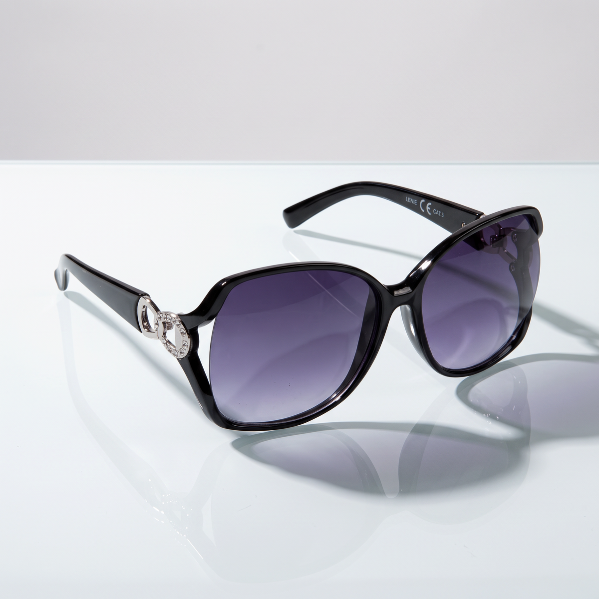 Eyelevel-UK Lexie oversized ladies sunglasses in black with silver accents and grey gradient UV400 lenses.