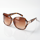 Eyelevel-UK Lexie oversized sunglasses in brown tortoiseshell with gold accents and brown gradient UV400 lenses.